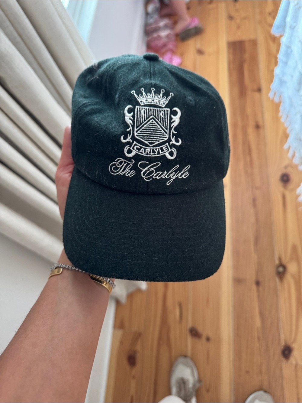 Sporty & Rich Black Baseball Cap with White Crest Embroidery